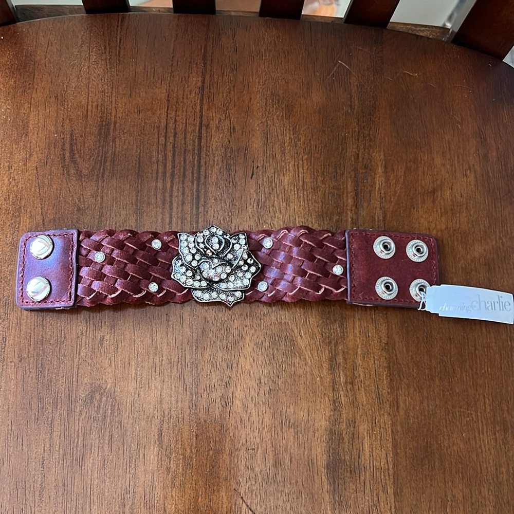 NWT Leather Cuff braided wristband with crystal rose embellishment. Adjustable